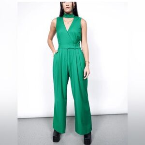 THE EMPOWER HIGH WAISTED V-NECK JUMPSUIT size 4 in BLACK, new and never worn